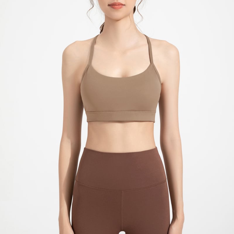 Sporta krūšturis skrējējiem un fitnesam – pilnas kupas, biezi veidotas kupas, fiksētas dubultās plecu siksnas, muguras aizdare ar trim sprādžām; galvenais materiāls: neilons; oderējums: spandekss