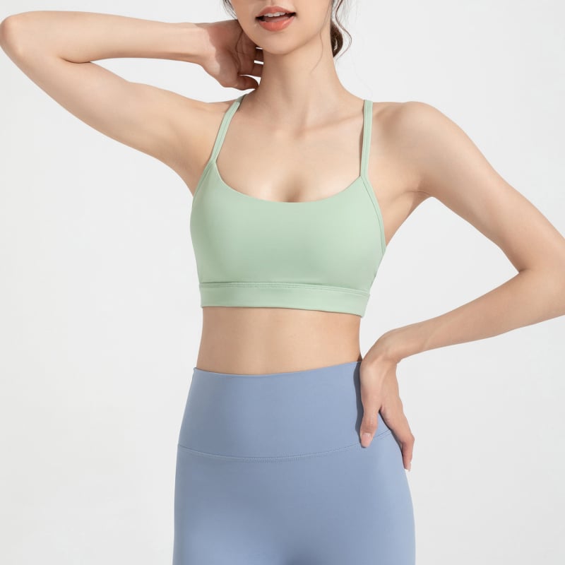 Sporta krūšturis skrējējiem un fitnesam – pilnas kupas, biezi veidotas kupas, fiksētas dubultās plecu siksnas, muguras aizdare ar trim sprādžām; galvenais materiāls: neilons; oderējums: spandekss