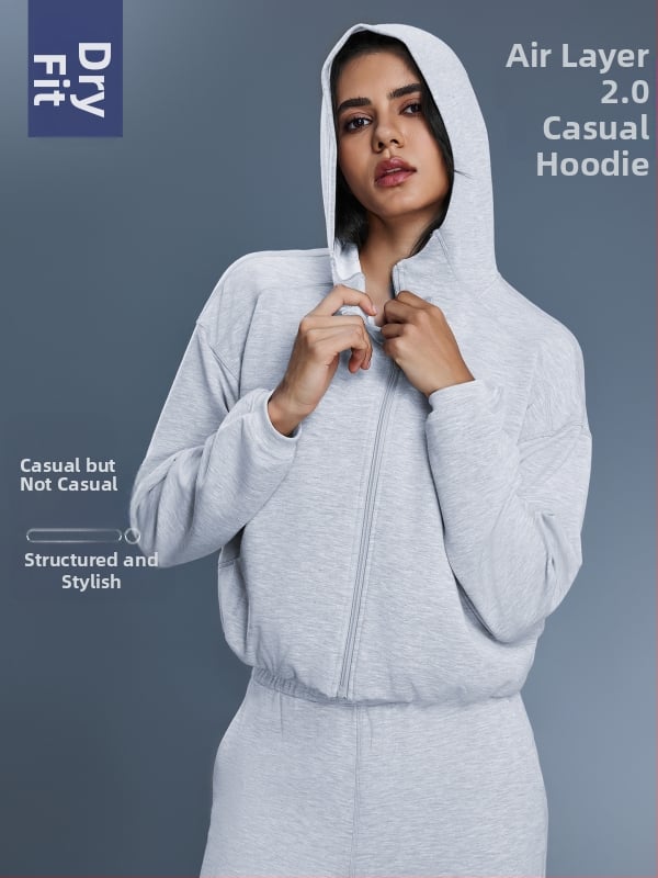 Női kapucnis cipzáros pulóver, lazán szabott, futáshoz és edzéshez, őszi-téli szezon; pamutkeverék anyag 52% poliészter; belső bélés pamut.