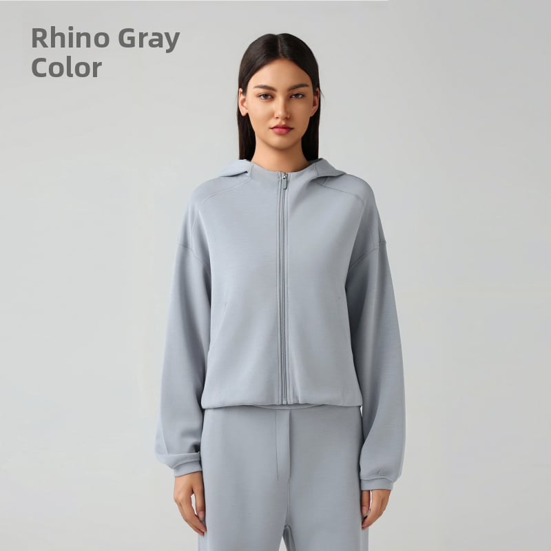 Női kapucnis cipzáros pulóver, lazán szabott, futáshoz és edzéshez, őszi-téli szezon; pamutkeverék anyag 52% poliészter; belső bélés pamut.