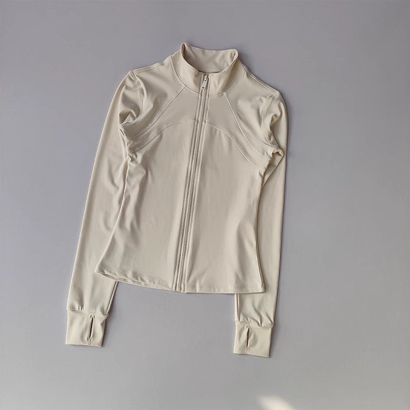 Moterų jogos striukė - ilgos rankovės, liesas kirpimas, klubų ilgis, greitai džiūstanti medžiaga, poliesterio 80% ir spandekso 20%