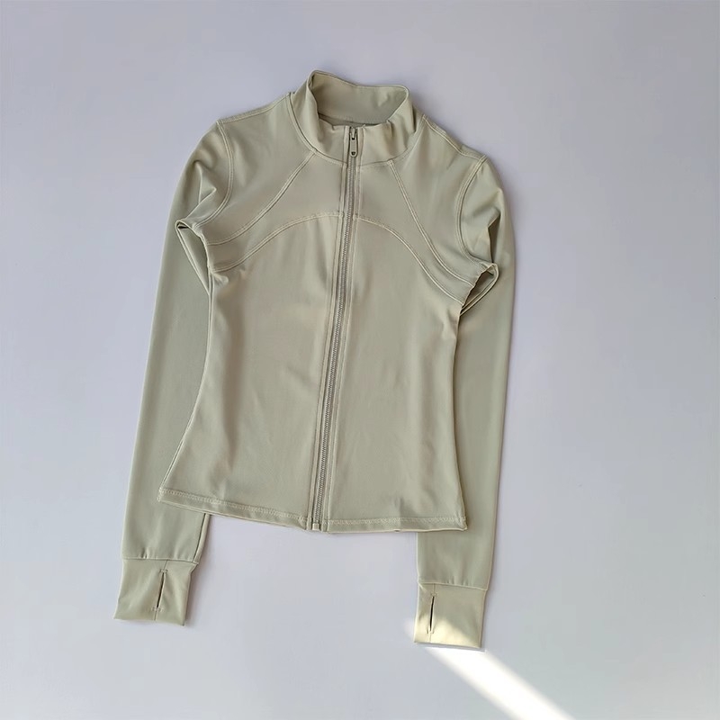 Moterų jogos striukė - ilgos rankovės, liesas kirpimas, klubų ilgis, greitai džiūstanti medžiaga, poliesterio 80% ir spandekso 20%