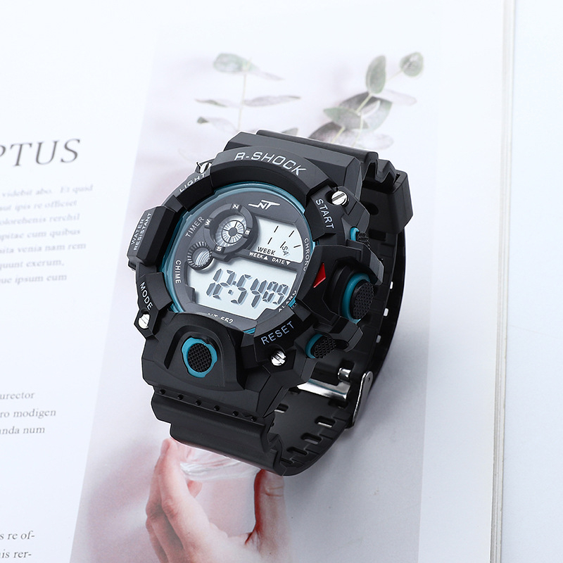 Vīriešu āra kalnu kāpšanas digitālais pulkstenis ar apgaismojumu, hronometrs, datums un signāls; elektroniskais mehānisms; korpuss PVC; siksna ABS