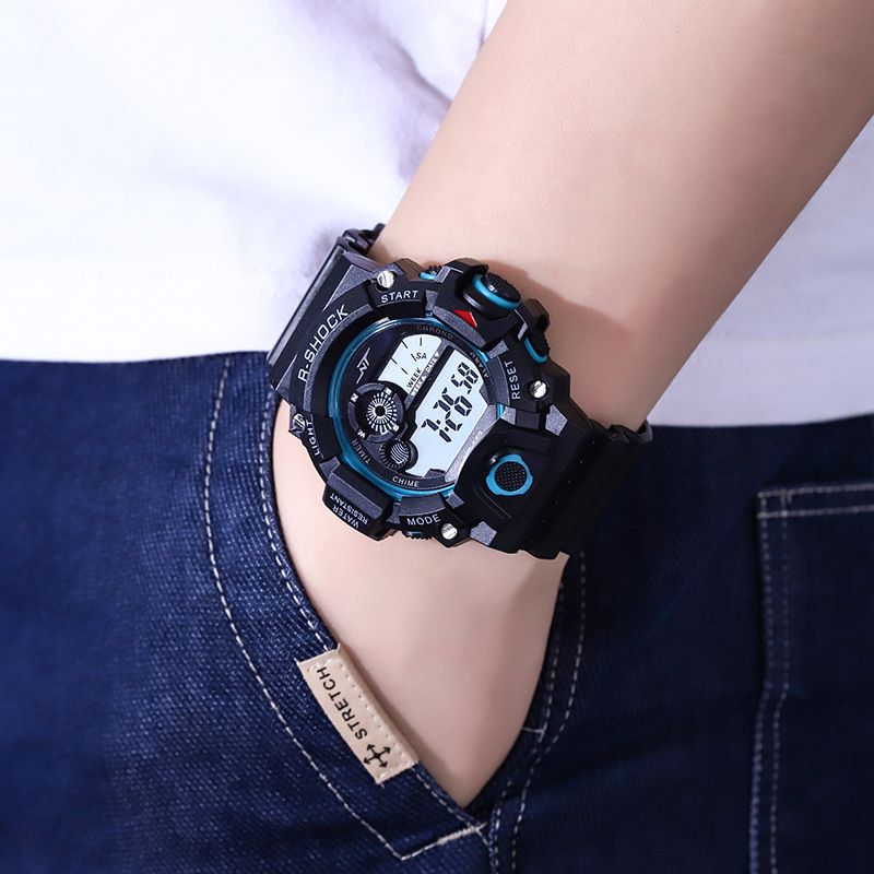 Vīriešu āra kalnu kāpšanas digitālais pulkstenis ar apgaismojumu, hronometrs, datums un signāls; elektroniskais mehānisms; korpuss PVC; siksna ABS