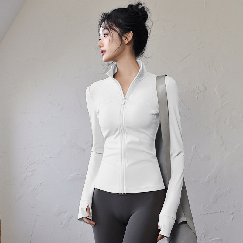 Ženski top za jogu i fitness – uski kroj, dugi rukavi, brzo sušeći materijal; tkanina: mješavina kemijskih vlakana, sastav tkanine: 82,5% poliester; podstava: Spandex, sadržaj podstave: poliester