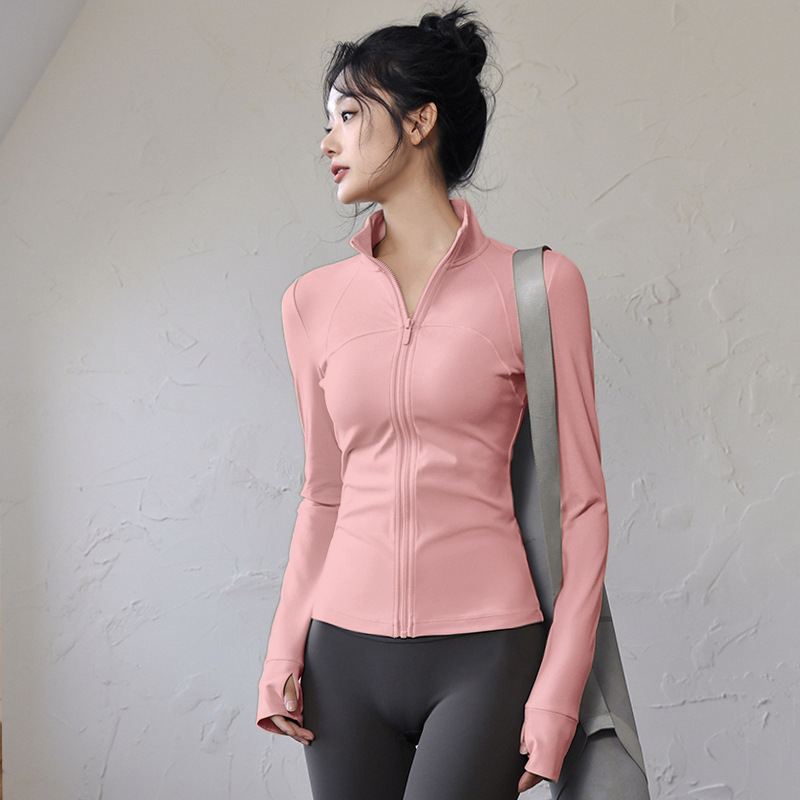 Ženski top za jogu i fitness – uski kroj, dugi rukavi, brzo sušeći materijal; tkanina: mješavina kemijskih vlakana, sastav tkanine: 82,5% poliester; podstava: Spandex, sadržaj podstave: poliester