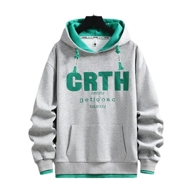 Tinédzser fiúknak kapucnis pulóver, ősz 2025 kiadás, pamut-poliészter keverék 53,6%/46,4%, lazán szabott, hímzett betűk, kenguru zseb