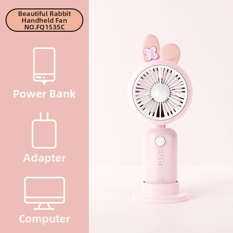 Rokas karikatūras dizaina pūtējs ar drukātu rokturi un karikatūras ausīm, uzlādējams, iebūvēta akumulatora kapacitāte 100-300 mAh, 5V, 5W, troksnis 36-45 dB, akumulatora darbības laiks 0-1 h