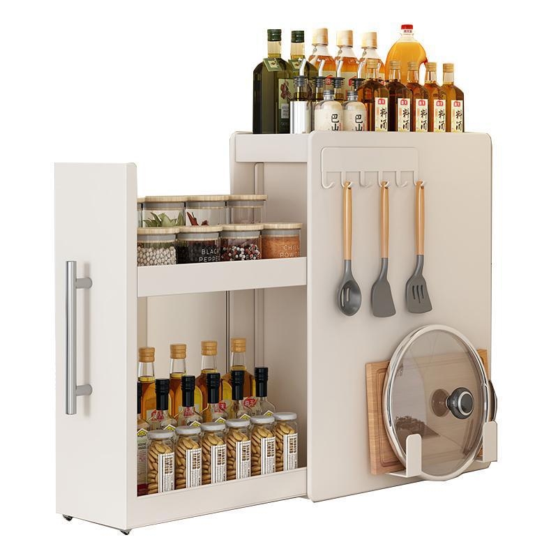 Traukiama prieskonių lentyna virtuvėje, siaura kraštinė, anglies plienas, prieskonių butelių organizatorius, ant stalviršio, minimalistinis stilius