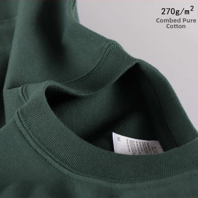 100% pamutból készült póló, kereknyakú, rövid ujjú, laza szabás, nehéz anyag