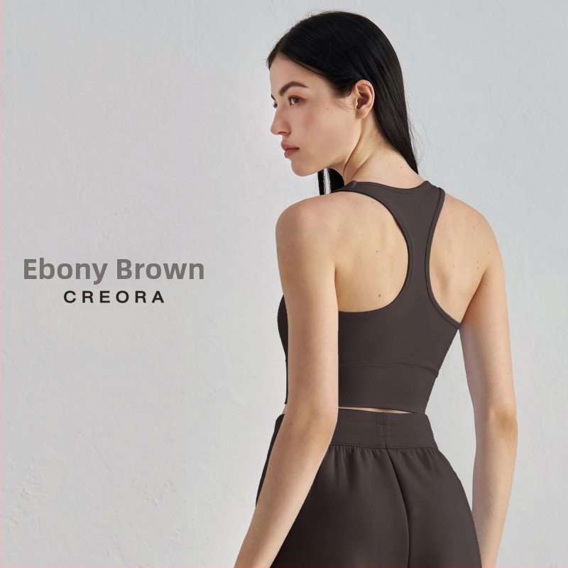 Joga sportinė liemenėlė su krūtinės pagalvėlė – 3/4 kupolas, vidutinio formos kaušelis, racerback su fiksuotomis dvigubomis petnešomis, audinys nailonas/elastanas