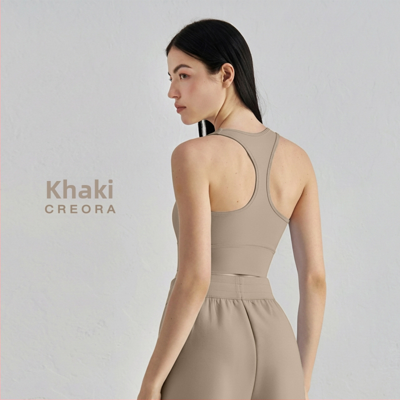 Joga sportinė liemenėlė su krūtinės pagalvėlė – 3/4 kupolas, vidutinio formos kaušelis, racerback su fiksuotomis dvigubomis petnešomis, audinys nailonas/elastanas