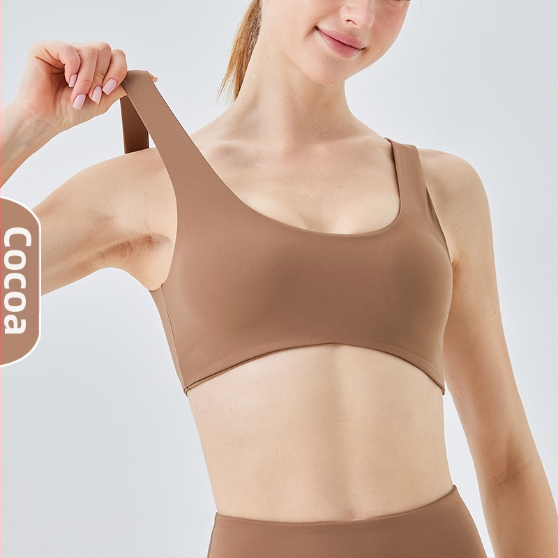 Sportinė liemenėlė; push-up ir atsparus smūgiams; 3/4 puodeliai; vidutinio puodelio forma; pagrindinė medžiaga 75% nailonas, pamušalas 25% spandeks