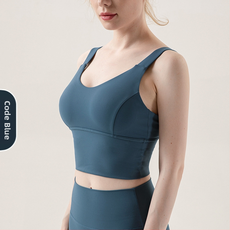 Sportinė liemenėlė; push-up ir atsparus smūgiams; 3/4 puodeliai; vidutinio puodelio forma; pagrindinė medžiaga 75% nailonas, pamušalas 25% spandeks