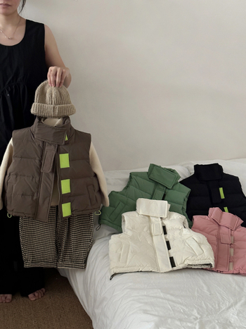 Laste pufuvest nailonist väliskihiga, 50% valgest pardi-puhast, villa vooder, tõmblukk, ühes toonis