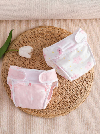 Vaikų treniravimo kelnaitės kategorija A – vandeniui atspari marle, skalbiasi, šoninio nuotėkio apsauga, amžiaus grupė 0–6 mėn, 6–12 mėn, 1–3 m; tinka 15 kg+