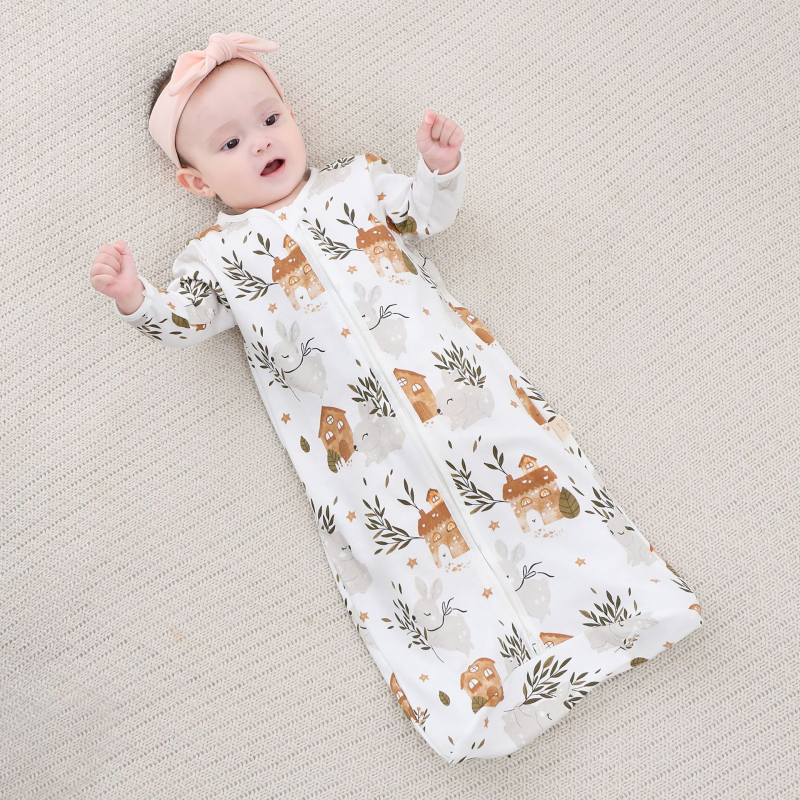 Kūdikio miego maišas – audinys ir pamušalas iš medvilnės ≥95%, užpildas medvilnė; keturi metų laikai; tinkama 1–3 metų vaikams, ilgis 80 cm; karikatūrų raštas