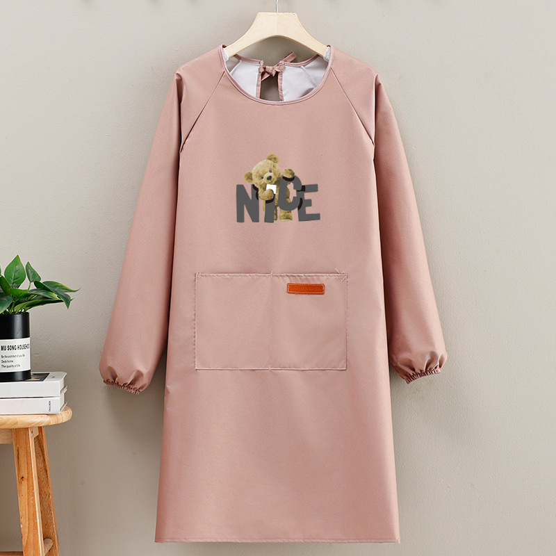 Suaugusiųjų prijuostė, atspari vandeniui, kompozitinė medžiaga, šiuolaikiškas minimalistinis stilius, karikatūrų raštas