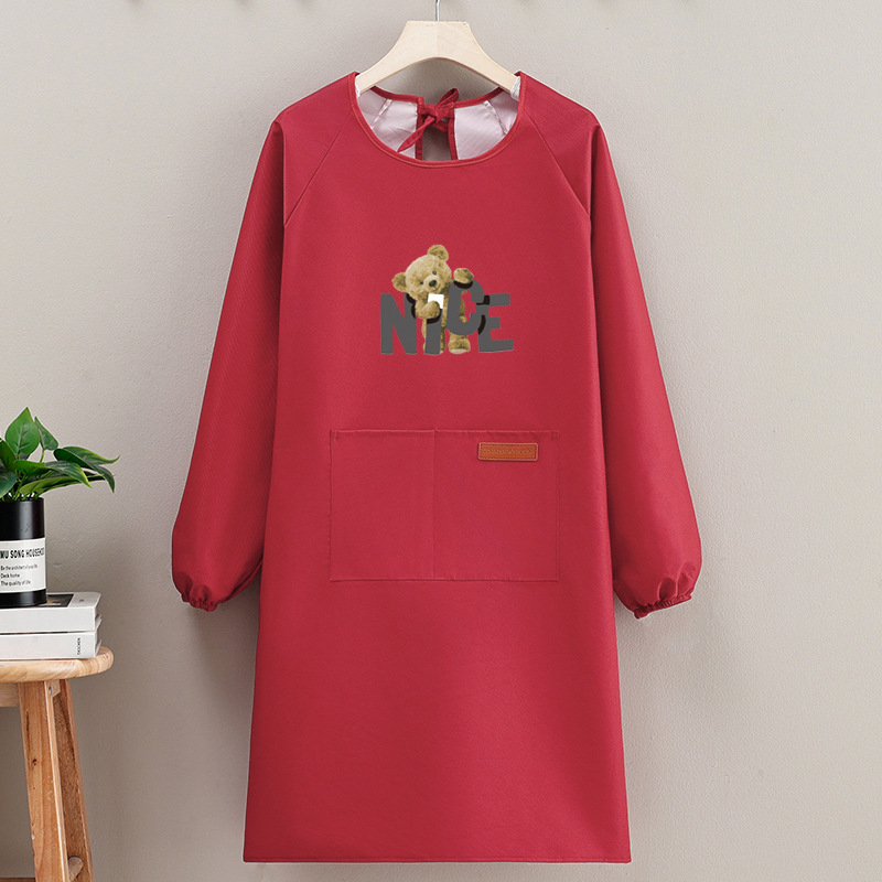 Suaugusiųjų prijuostė, atspari vandeniui, kompozitinė medžiaga, šiuolaikiškas minimalistinis stilius, karikatūrų raštas