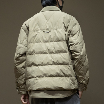 Prešívaná bunda s bielym kačacím perím, kapucňa, zips, voľný strih, zimný model