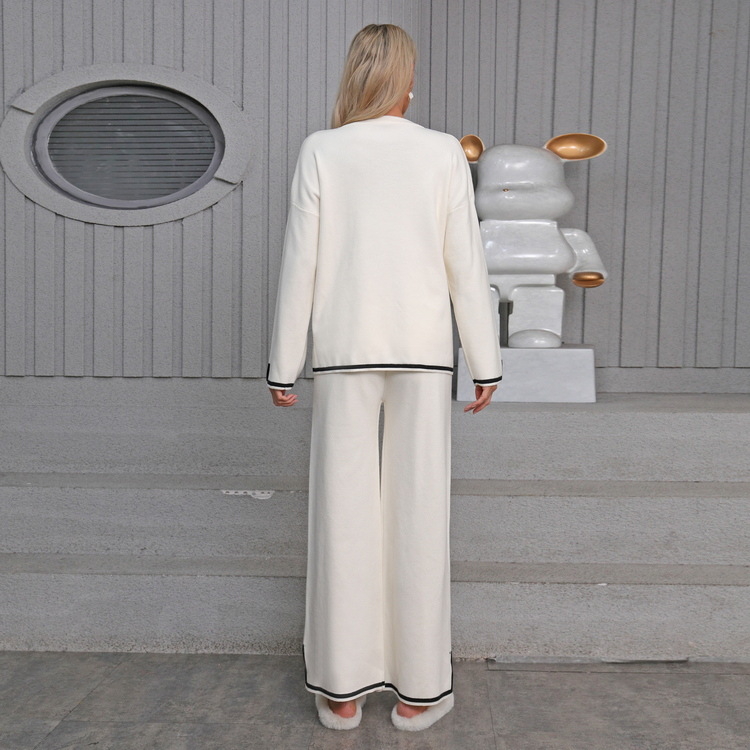 Плетен двучастен комплект от модална основна прежда, топ с дълги ръкави и панталони с висока талия и прави широки крачоли – зима 2025