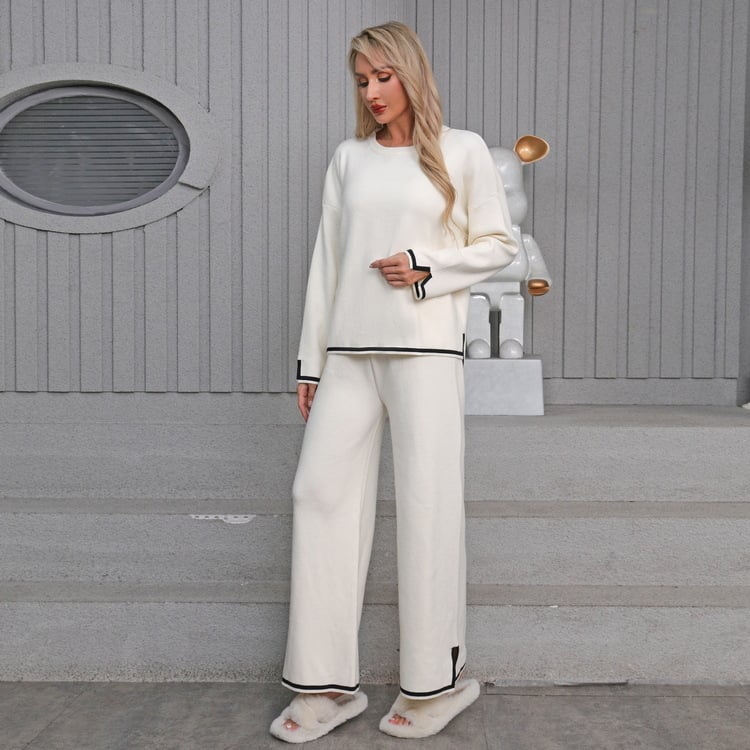 Плетен двучастен комплект от модална основна прежда, топ с дълги ръкави и панталони с висока талия и прави широки крачоли – зима 2025