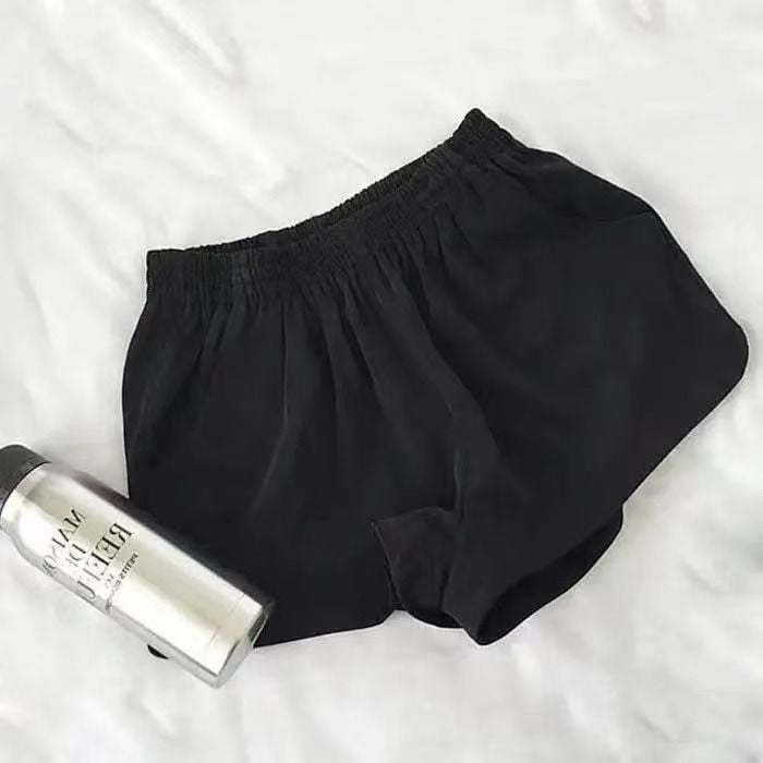 Pantaloni largi din lână, talie elastică, lungime 3/4, buzunare