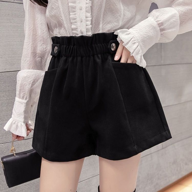 Pantaloni largi din lână, talie elastică, lungime 3/4, buzunare