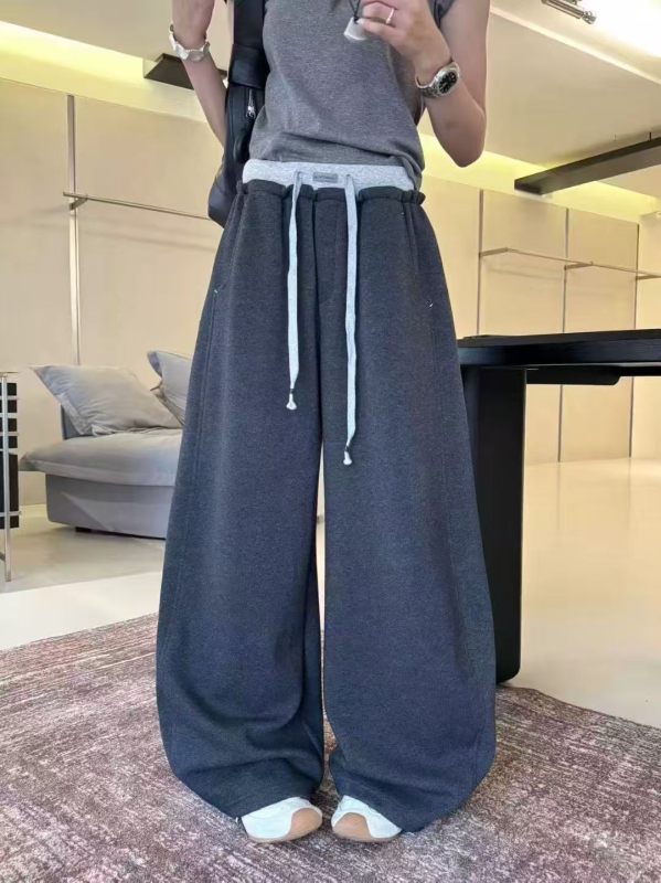 Francuski stil trenirke hlače s vezanjem u struku i elastičnim pojasom, široke nogavice, duljina do poda, jesen 2025, casual moda