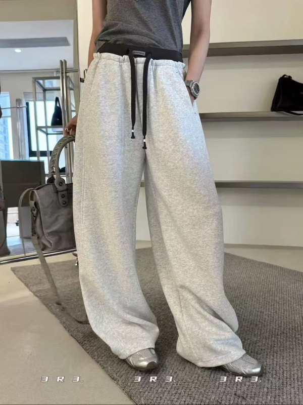 Francuski stil trenirke hlače s vezanjem u struku i elastičnim pojasom, široke nogavice, duljina do poda, jesen 2025, casual moda