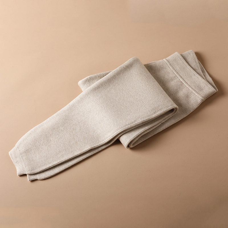 Unisex vilnos termo kelnes, aukštos juosmens su elastiniu dizainu, vidutinio svorio 181–200 g/m², vienos spalvos