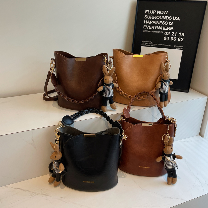 PU bucket táska nőknek, városi minimalistikus stílus, cipzáros zárás, poliészter bélés