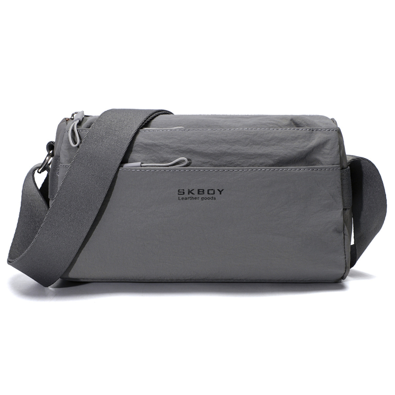 Keresztpántos válltáska, prémium anyag, hétköznapi utazási stílus, egyetlen vállpánt, cipzáras nyitás, belső zsebek telefonhoz és dokumentumokhoz