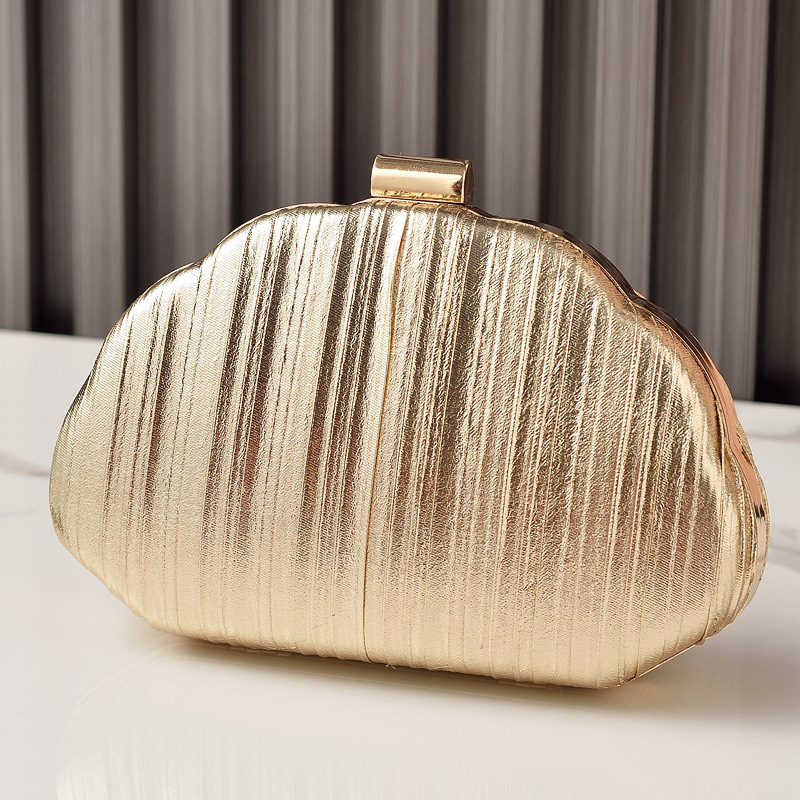 Kagyló alakú esti táska, merev héj, láncos vállpánt, zárható, poliészter bélés