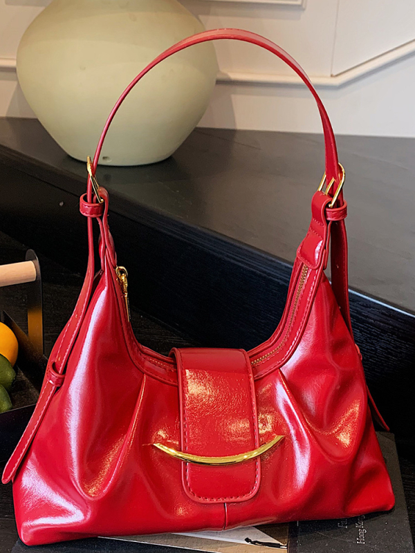 Kaenlaalune kott linna minimalistliku stiiliga, PU materjalist, horisontaalne ristkülikukujuline kuju, tõmblukk, üks rihm