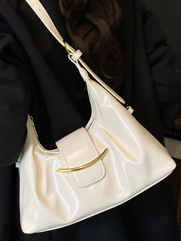 Kaenlaalune kott linna minimalistliku stiiliga, PU materjalist, horisontaalne ristkülikukujuline kuju, tõmblukk, üks rihm