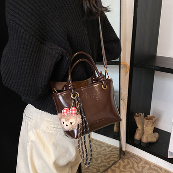 PU bucket kott, crossbody magnetilise sulgemisega, horisontaalne ruudukujuline kuju, sisemine telefoni tasku.