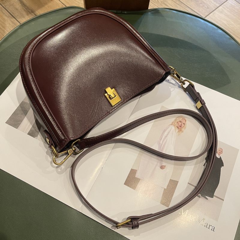 Geantă Saddle din piele autentică – stil urban minimalist, formă cochilie, buzunar intern pentru telefon și buzunar laminat cu fermoar