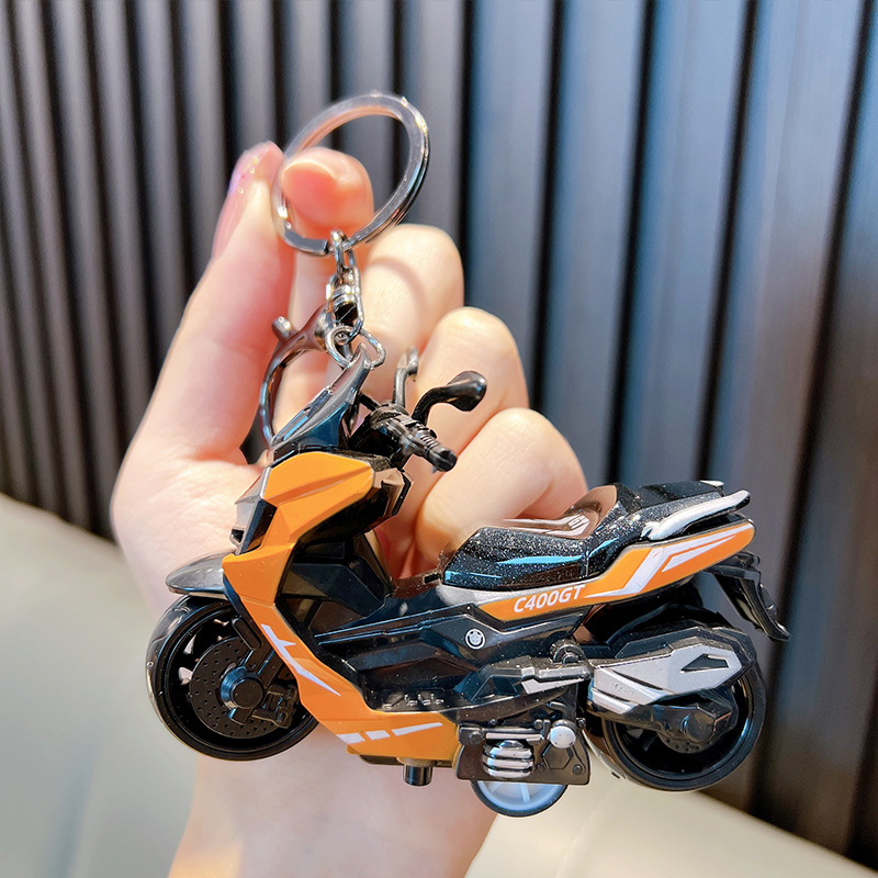 Privjesak za ključeve motocikla s crtić dizajnom, plastični, mehanizam za izvlačenje, samostalno pakiranje