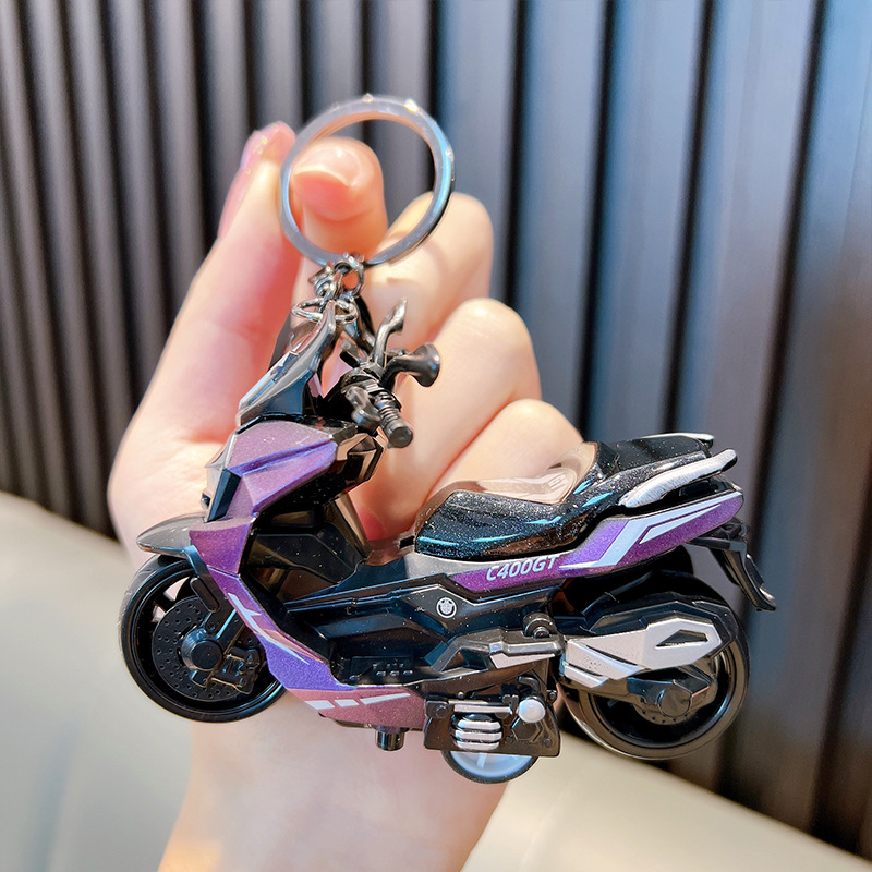 Privjesak za ključeve motocikla s crtić dizajnom, plastični, mehanizam za izvlačenje, samostalno pakiranje