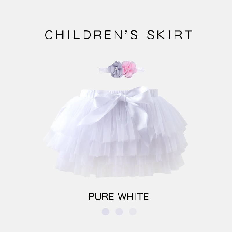 Bērnu svārki, vienkrāsains cake stila svārki, ārējais materiāls 95% neilons, oderes modal; bērniem 1–3 gadi. (ārējais materiāls 95% neilons, oderes modal, vienkrāsains, cake stils, vecums 1–3)