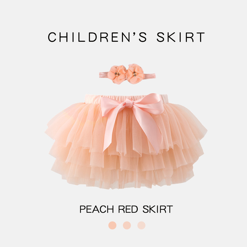 Bērnu svārki, vienkrāsains cake stila svārki, ārējais materiāls 95% neilons, oderes modal; bērniem 1–3 gadi. (ārējais materiāls 95% neilons, oderes modal, vienkrāsains, cake stils, vecums 1–3)