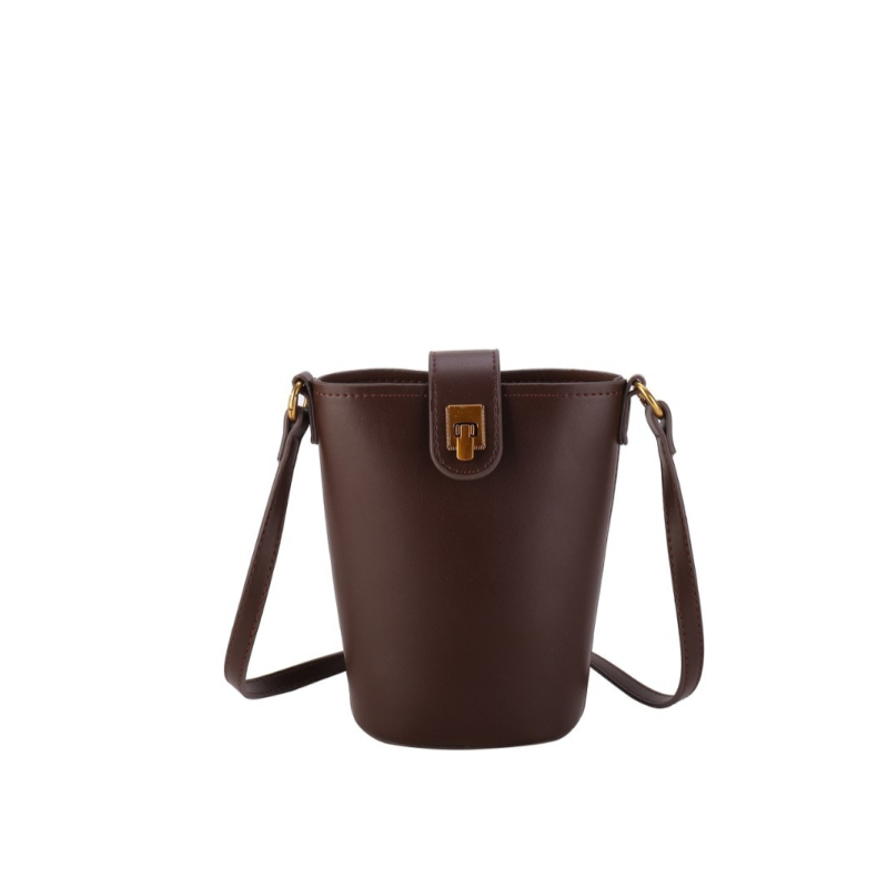 PU bucket kott vertikaalse ruudukujulise kujuga, klapiga suletav ja telefoni taskuga