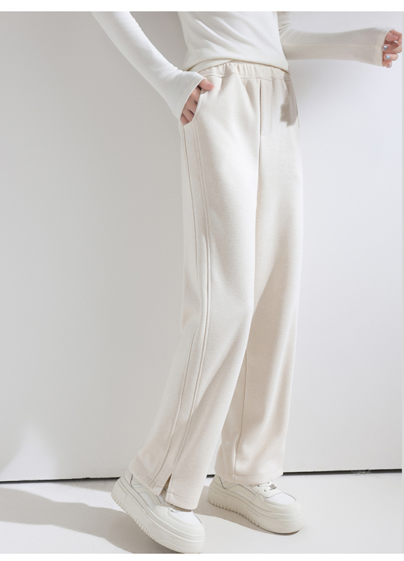 Laiad püksid kõrge vöökoht, villane kangas, elegantne linnustiil, sügis 2025