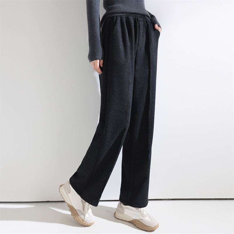 Laiad püksid kõrge vöökoht, villane kangas, elegantne linnustiil, sügis 2025