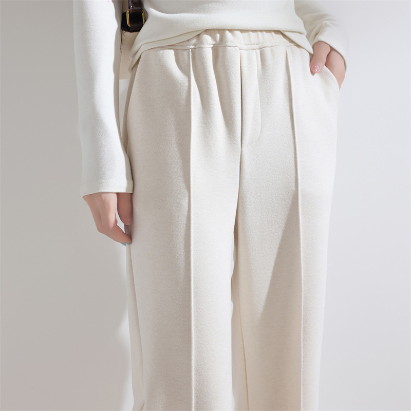 Laiad püksid kõrge vöökoht, villane kangas, elegantne linnustiil, sügis 2025