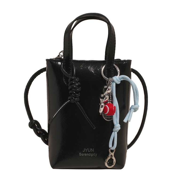 PU ämberlaadse koti lukuga, sisetaskud telefoni ja ID-kaardile, voodrita