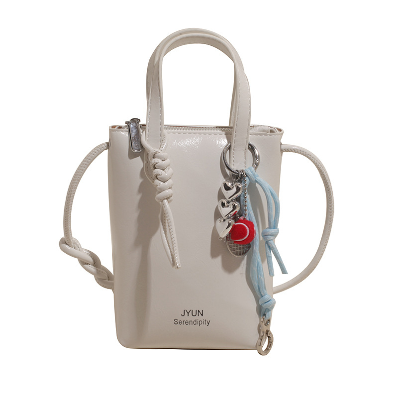 PU ämberlaadse koti lukuga, sisetaskud telefoni ja ID-kaardile, voodrita