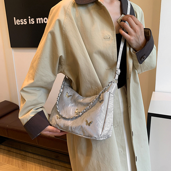 Õla- ja kaenla kott loki motiiviga - PU nahk, suur maht, tõmblukk, sisetaskud telefonile ja ID-le