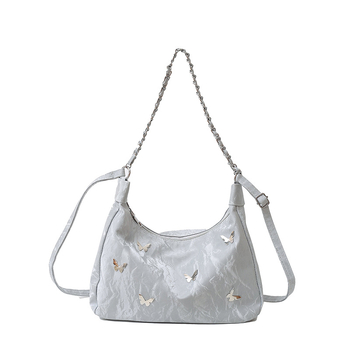 Õla- ja kaenla kott loki motiiviga - PU nahk, suur maht, tõmblukk, sisetaskud telefonile ja ID-le